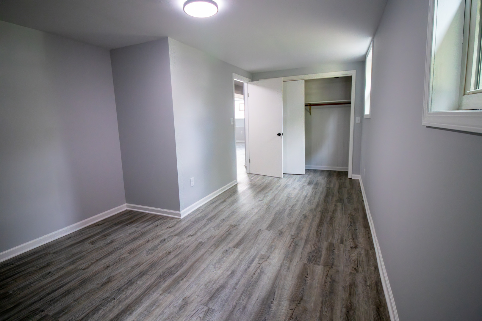 2602 Fairway Drive Joliet, IL 60435 - Photo 28 of 43 wooden floor in an empty room with a window