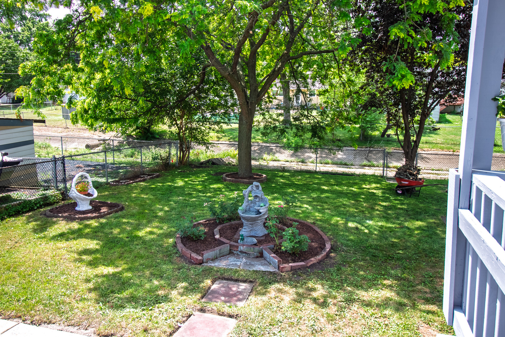 2602 Fairway Drive Joliet, IL 60435 - Photo 36 of 43 a view of a garden with a fountain