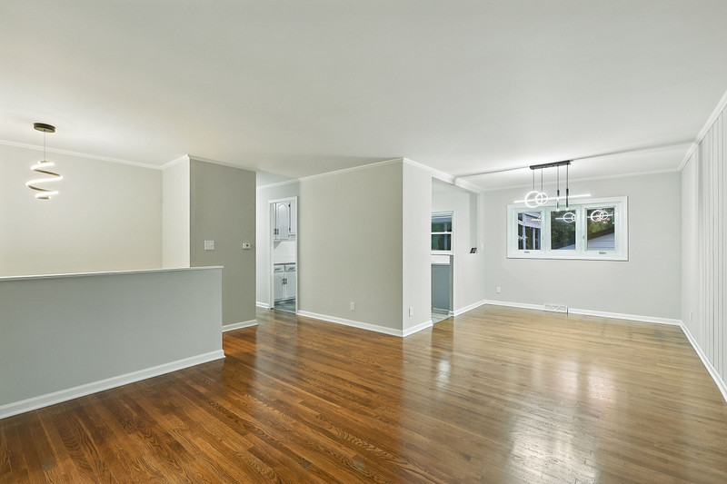 2602 Fairway Drive Joliet, IL 60435 - Photo 5 of 43 a view of an empty room with window and wooden floor