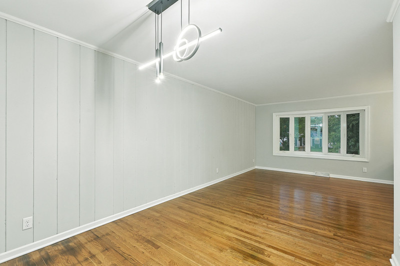 2602 Fairway Drive Joliet, IL 60435 - Photo 6 of 43 a view of an empty room with wooden floor and a window
