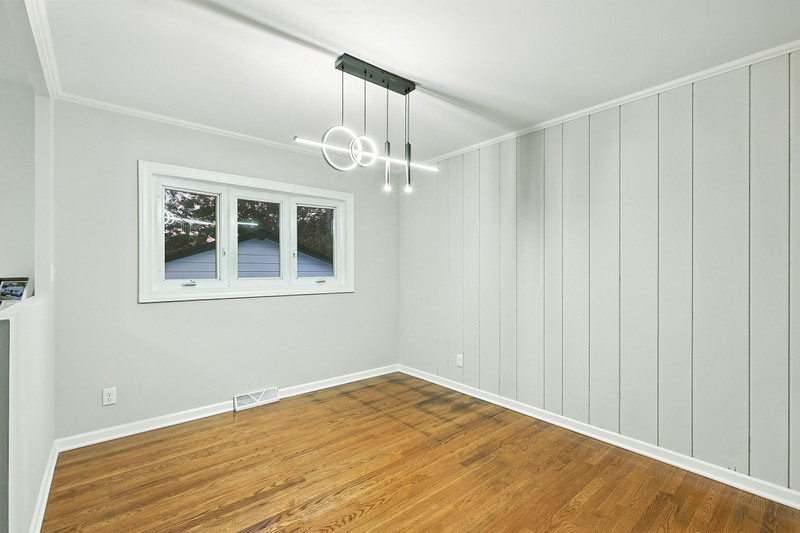 2602 Fairway Drive Joliet, IL 60435 - Photo 8 of 43 a view of a livingroom with a chandelier fan and wooden floor