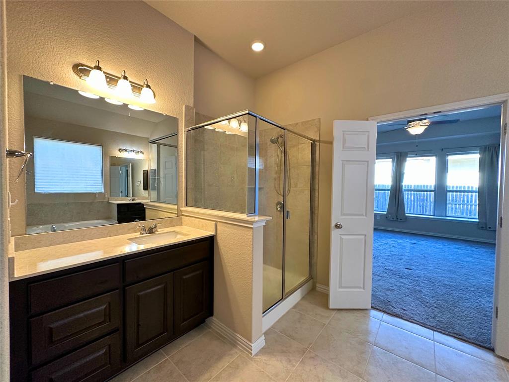 3117 Hidalgo Loop Round Rock, TX 78665 - Photo 17 of 27 a bathroom with a granite countertop sink mirror and double