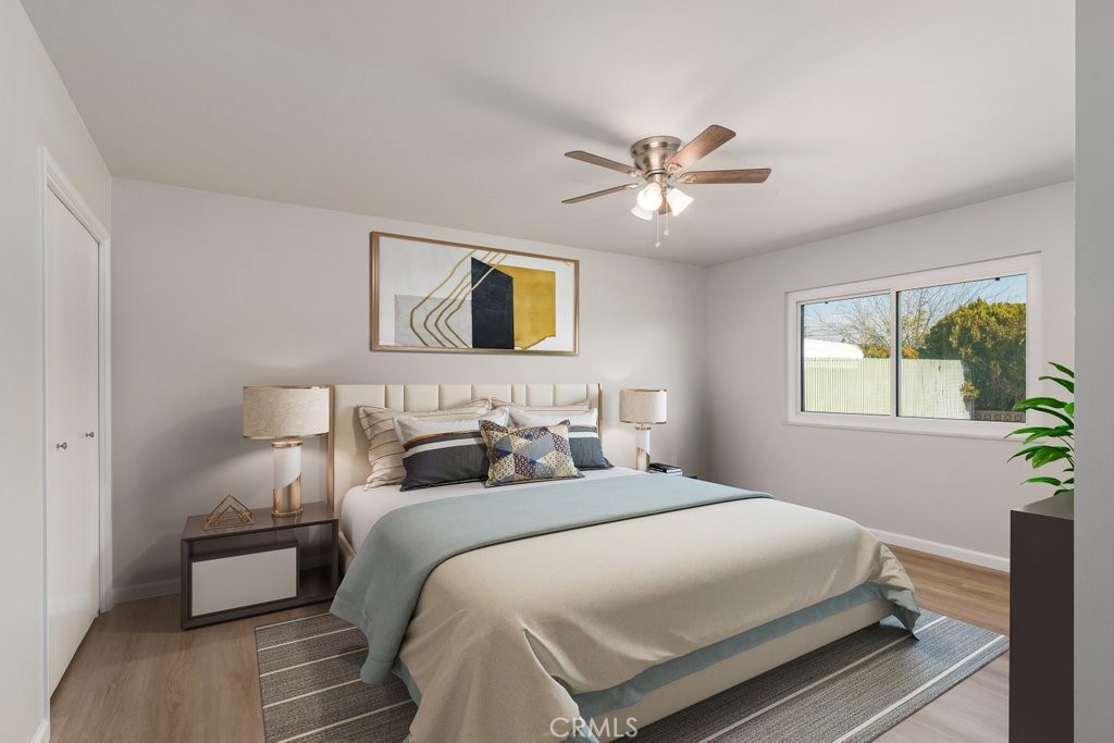 28548 Middlebury Way Menifee, CA 92586 - Photo 11 of 15 a bedroom with a bed and a window