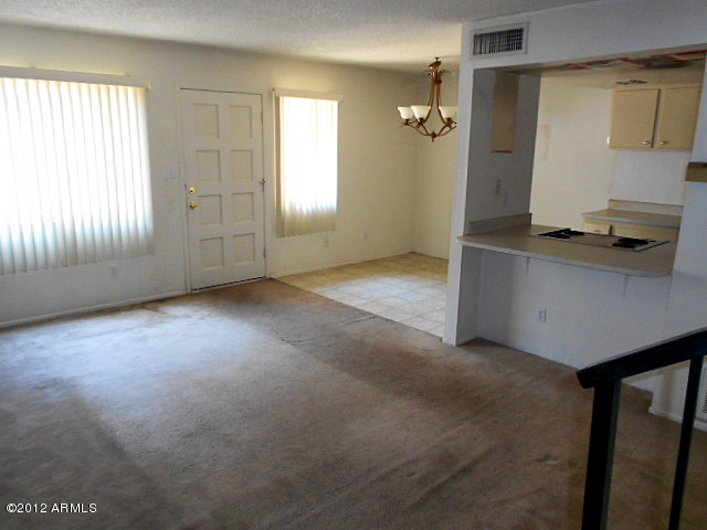 600 South Dobson Road, Unit 48 Mesa, AZ 85202 - Photo 17 of 19 living room and kitchen