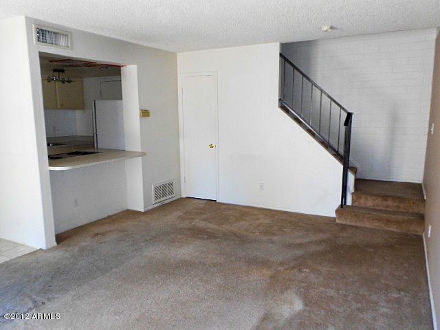 600 South Dobson Road, Unit 48 Mesa, AZ 85202 - Photo 18 of 19 staircase and kitchen