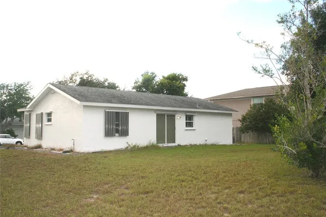 a view of house with outdoor space