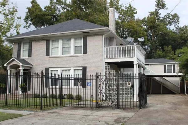 a front view of a house with balcony