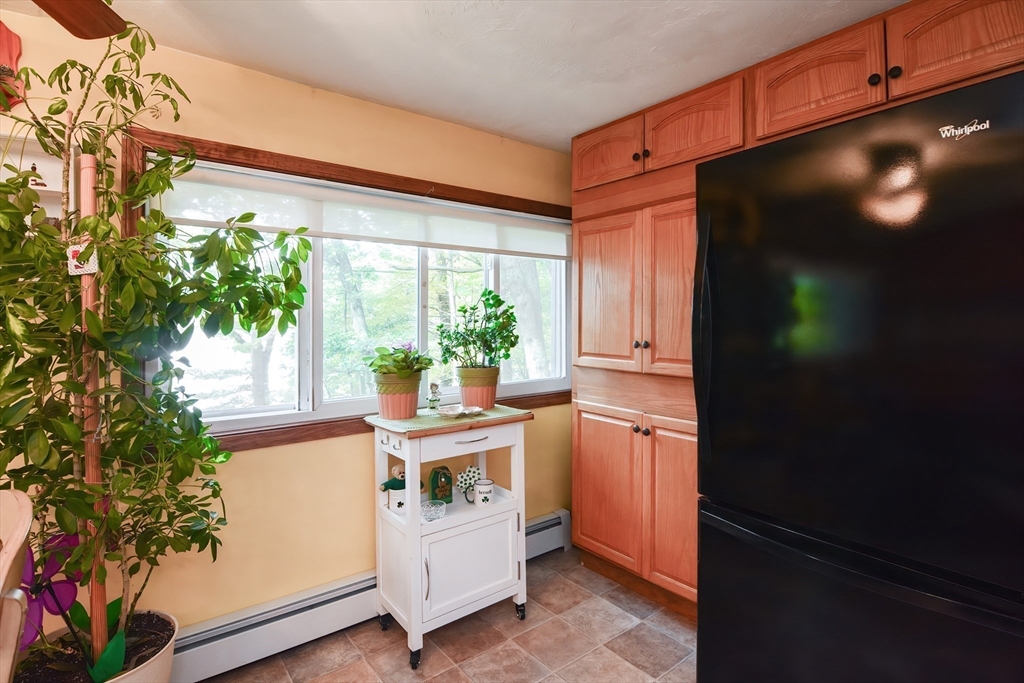 115 Wickaboag Valley Road West Brookfield, MA 01585 - Photo 13 of 31 a kitchen view of a house and a potted plant