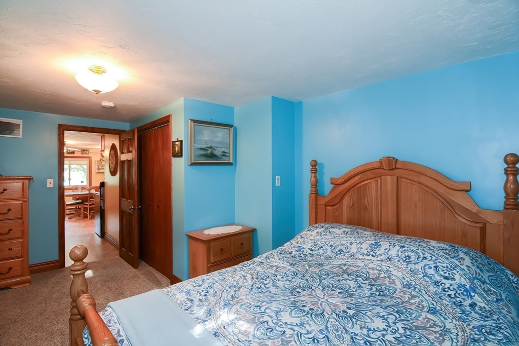 115 Wickaboag Valley Road West Brookfield, MA 01585 - Photo 16 of 31 a bedroom with a bed and a view of bathroom