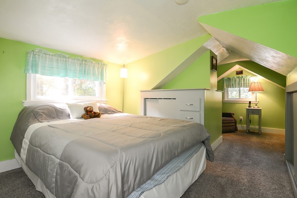 115 Wickaboag Valley Road West Brookfield, MA 01585 - Photo 19 of 31 a spacious bedroom with a bed and a cabinets