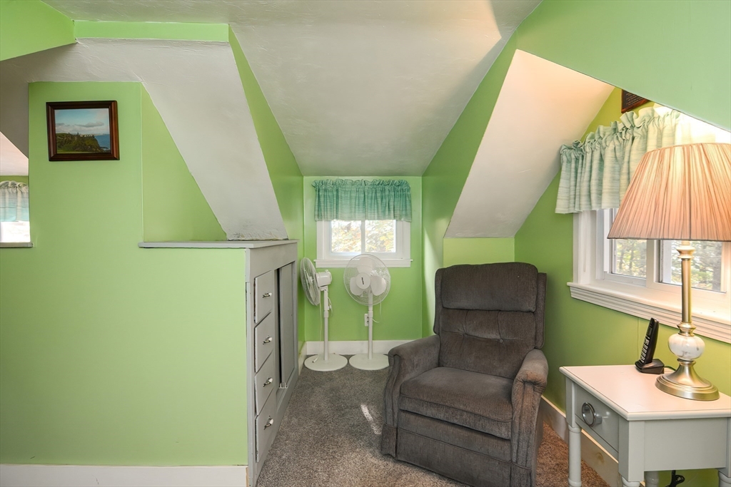 115 Wickaboag Valley Road West Brookfield, MA 01585 - Photo 21 of 31 a living room with furniture and a window