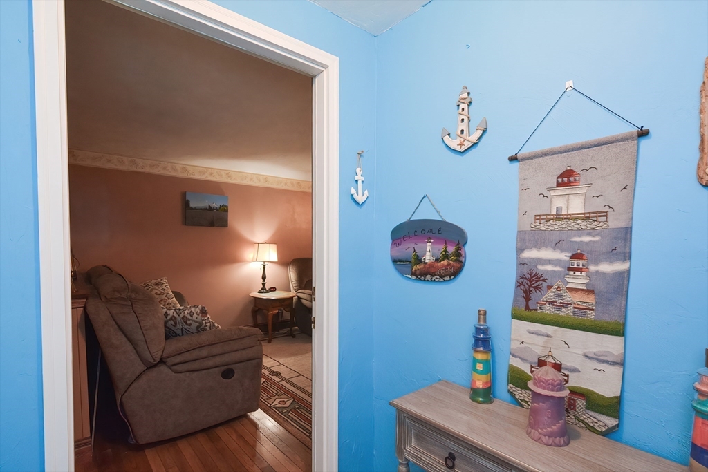 115 Wickaboag Valley Road West Brookfield, MA 01585 - Photo 6 of 31 a living room with furniture and wooden floor