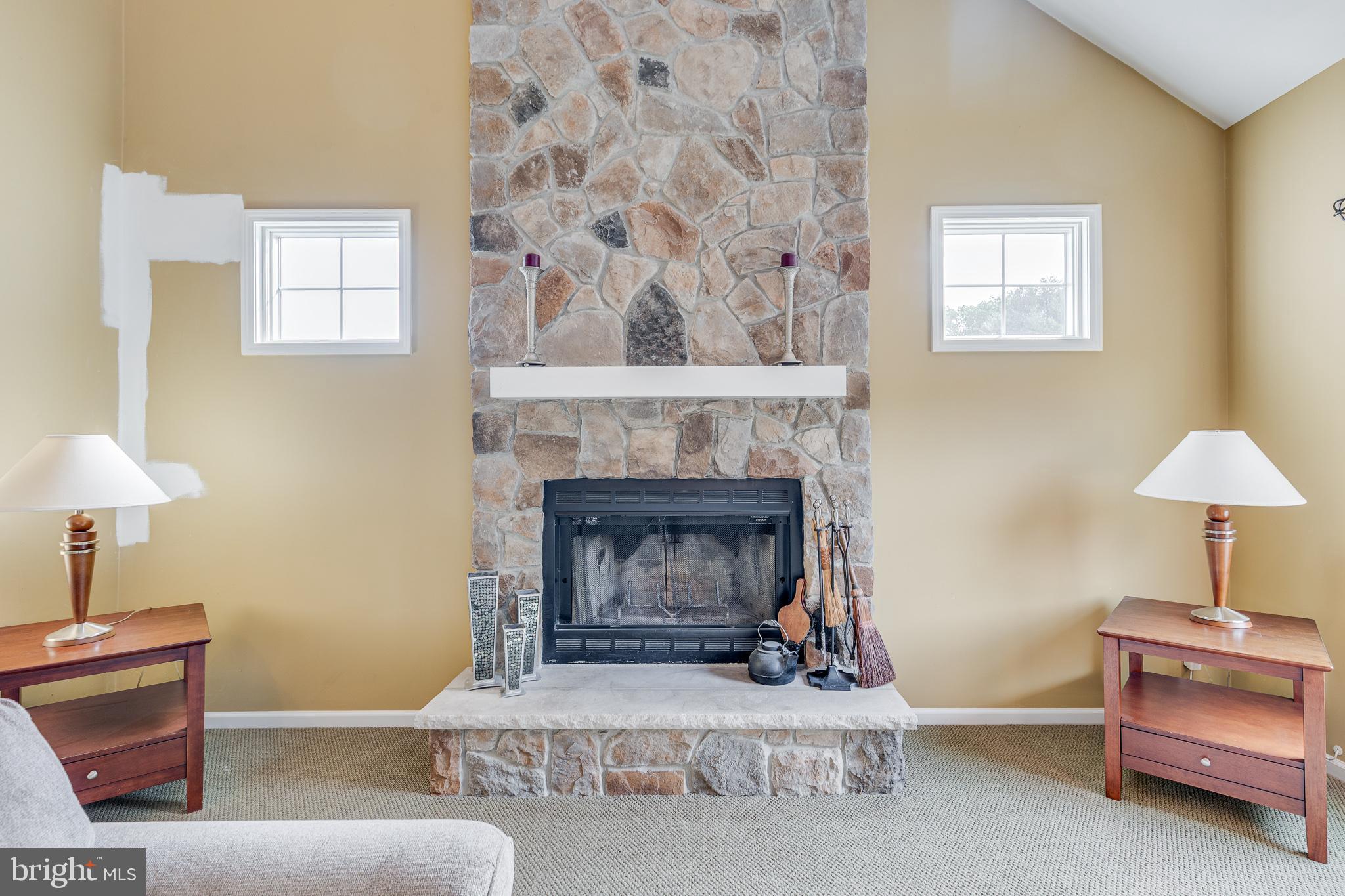 2 Dellaira Court Wrightstown, NJ 08562 - Photo 29 of 93 a living room with furniture and a fireplace