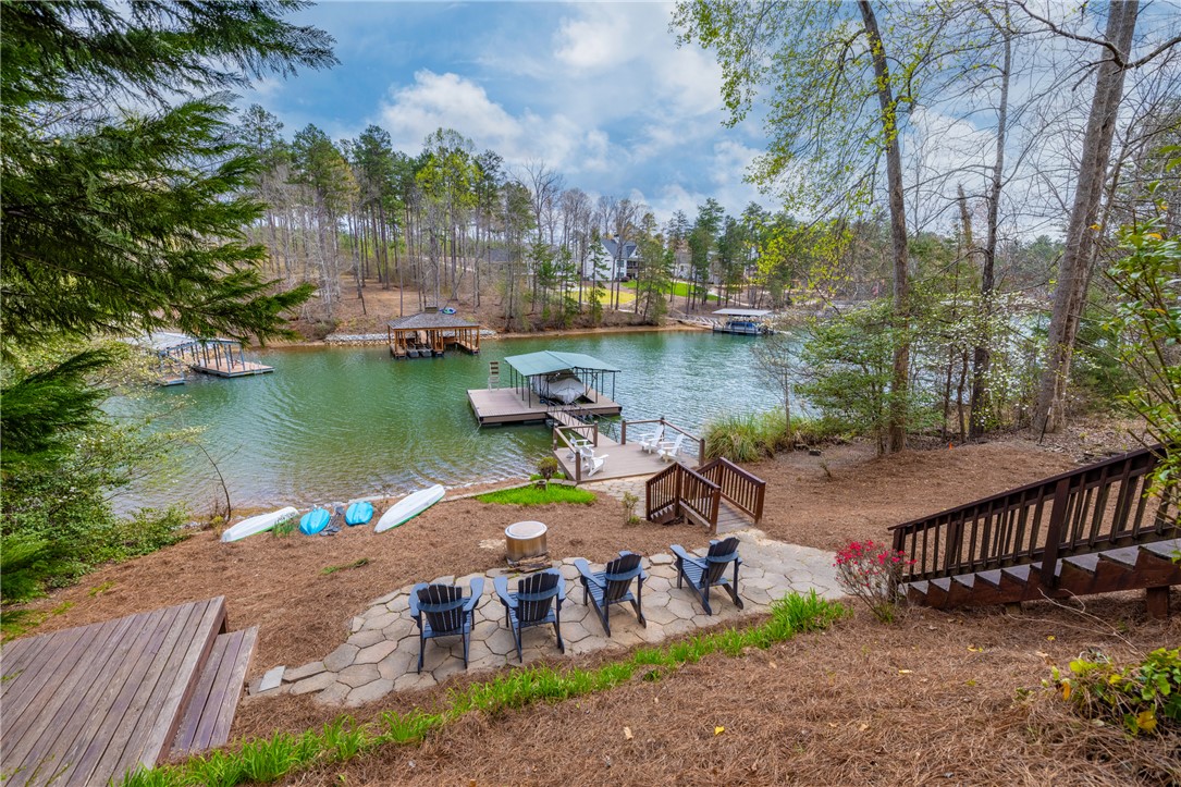 203 Little Lane Seneca, SC 29672 - Photo 40 of 48 This captivating lakefront property boasts a private dock, offering direct access to serene waters.