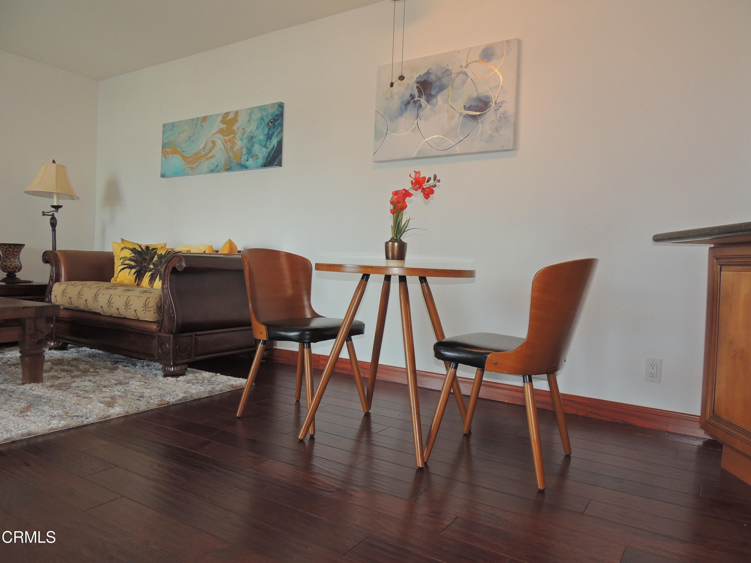 2901 Peninsula Road, Unit 237 Oxnard, CA 93035 - Photo 11 of 35 a workspace with furniture and wooden floor