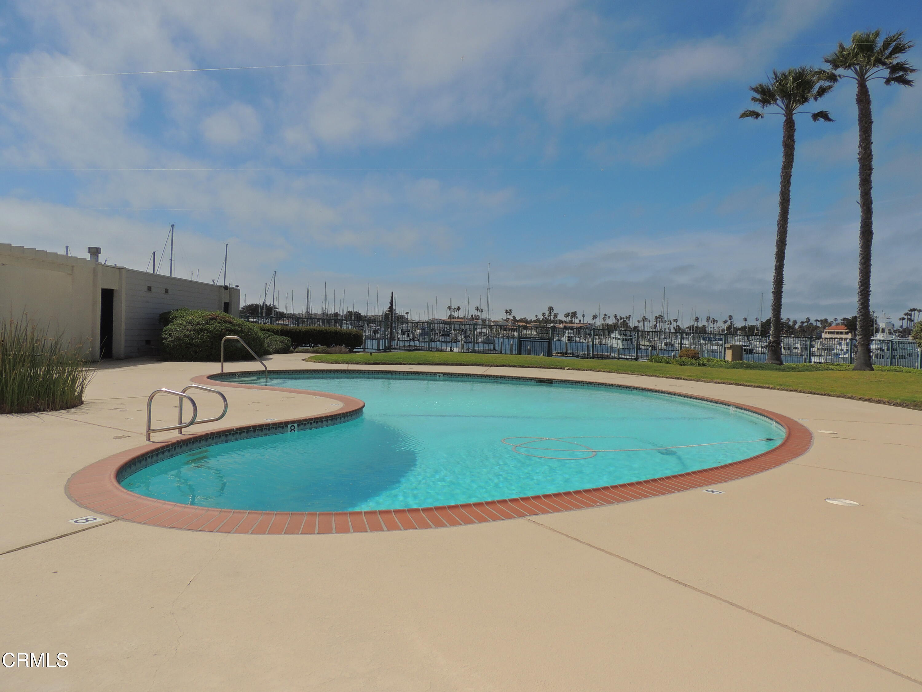 2901 Peninsula Road, Unit 237 Oxnard, CA 93035 - Photo 20 of 35 a view of a swimming pool with a yard