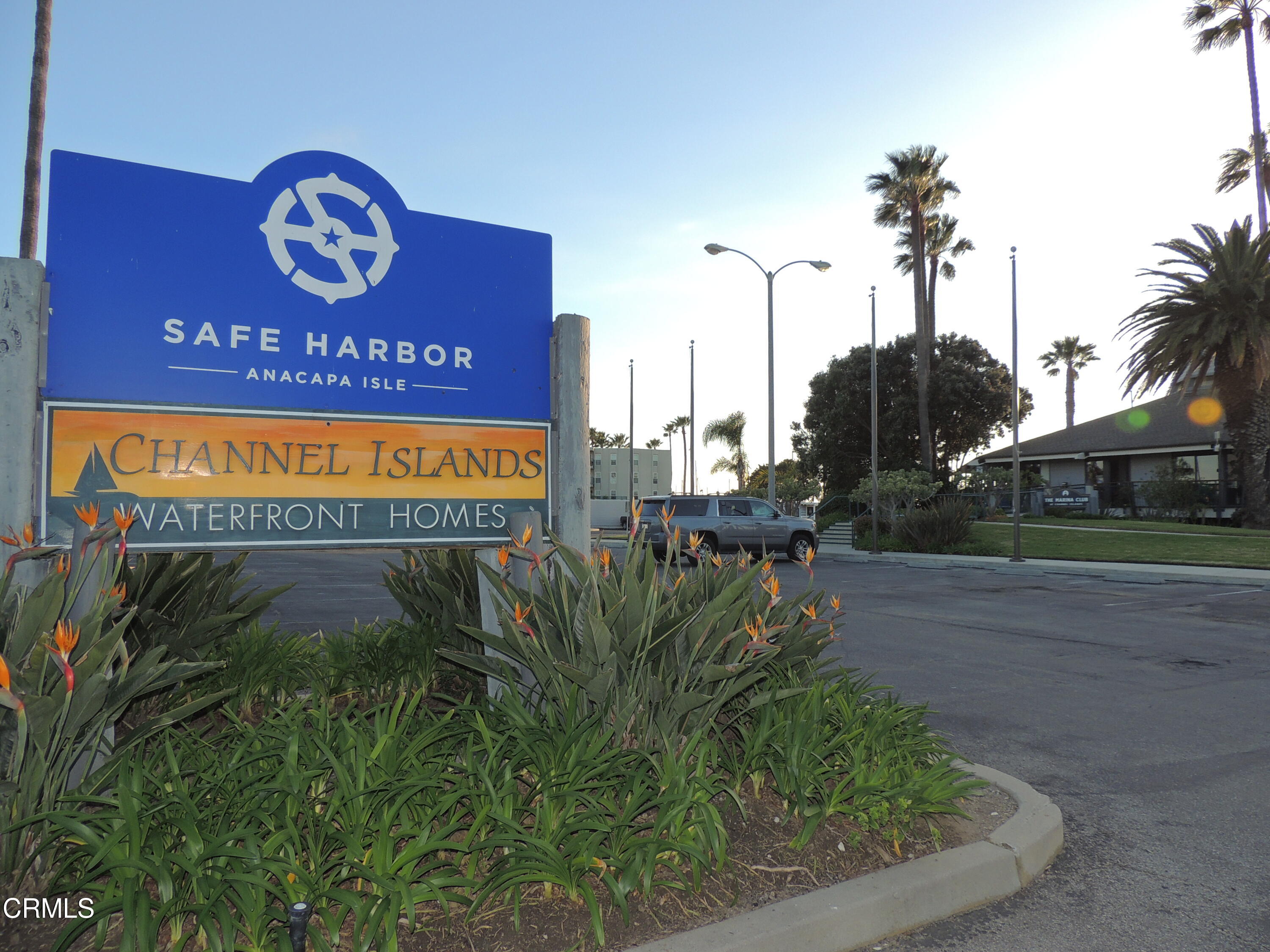 2901 Peninsula Road, Unit 237 Oxnard, CA 93035 - Photo 25 of 35 a sign on the side of the road