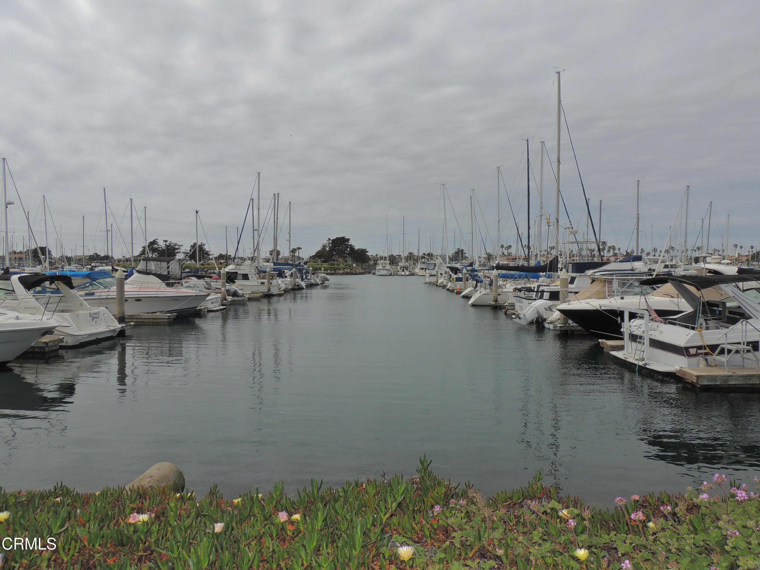2901 Peninsula Road, Unit 237 Oxnard, CA 93035 - Photo 33 of 35 a view of a lake with boats next to a bridge