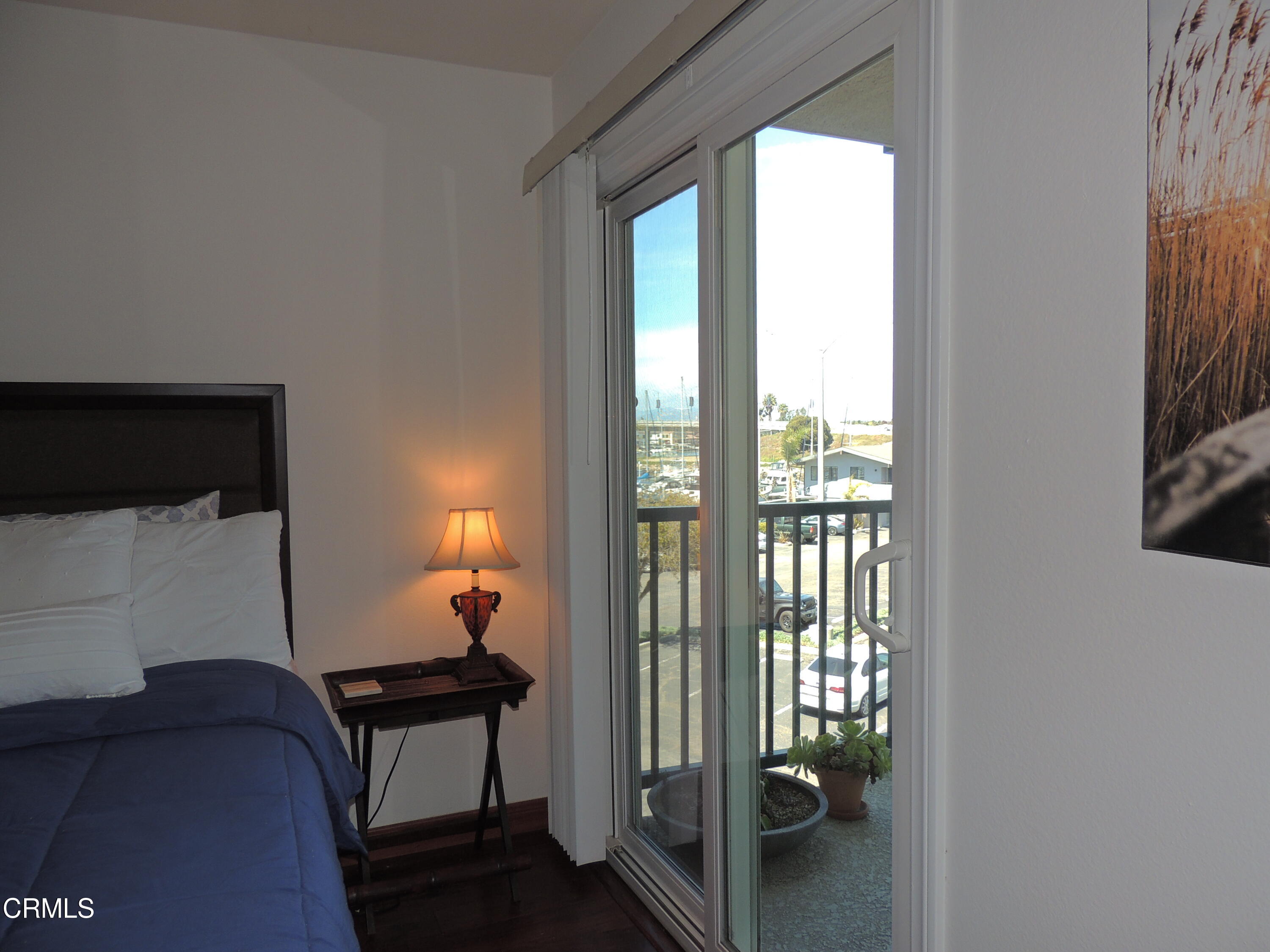 2901 Peninsula Road, Unit 237 Oxnard, CA 93035 - Photo 8 of 35 a room with a bed and a window