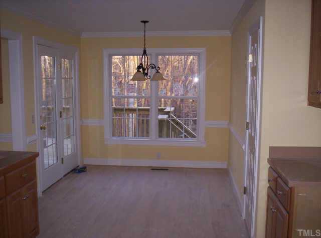 4 Younger Road Roxboro, NC 27573 - Photo 4 of 5 a view of livingroom with chandelier and glass door
