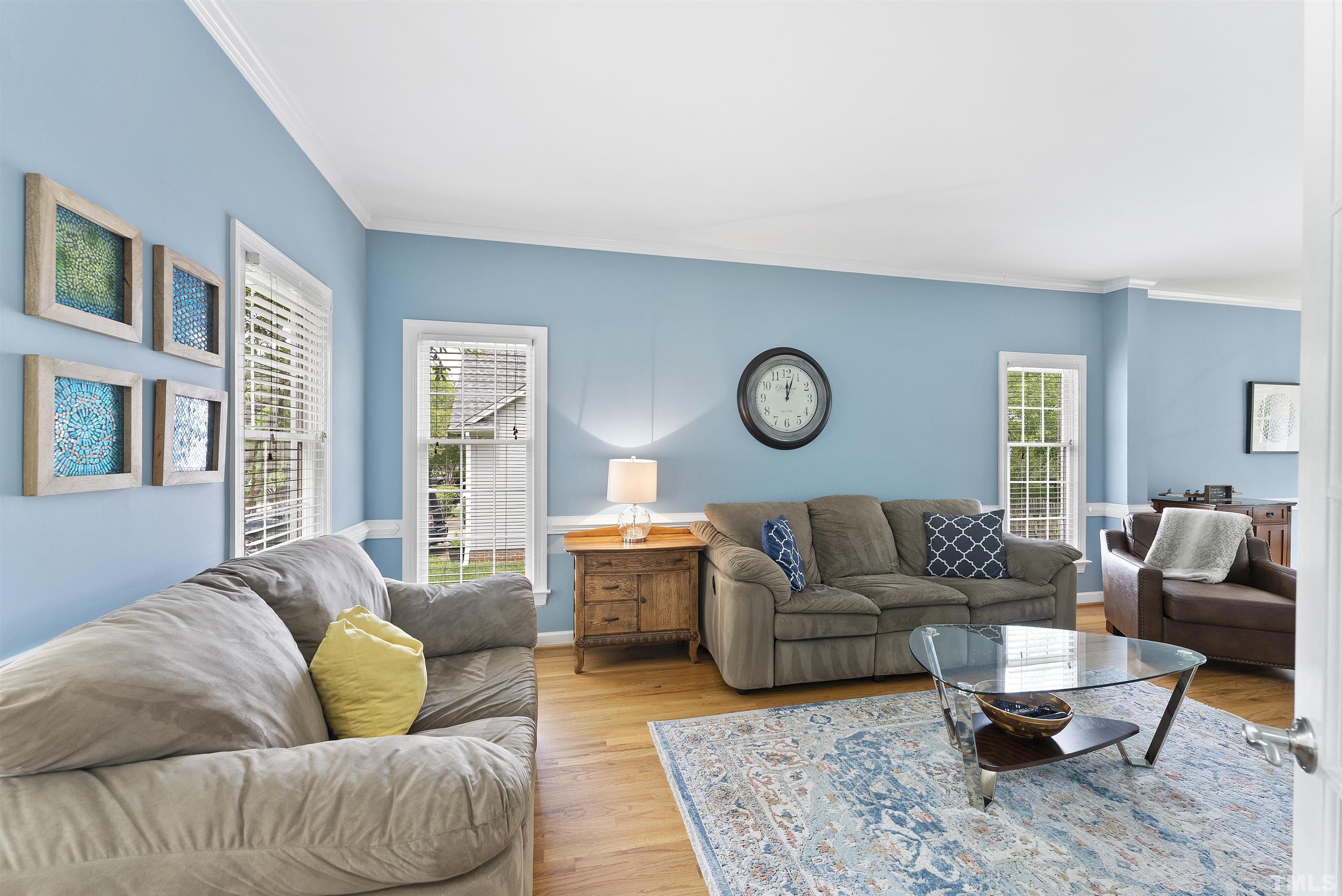 12304 Tappersfield Court Raleigh, NC 27613 - Photo 14 of 41 a living room with furniture and a large window