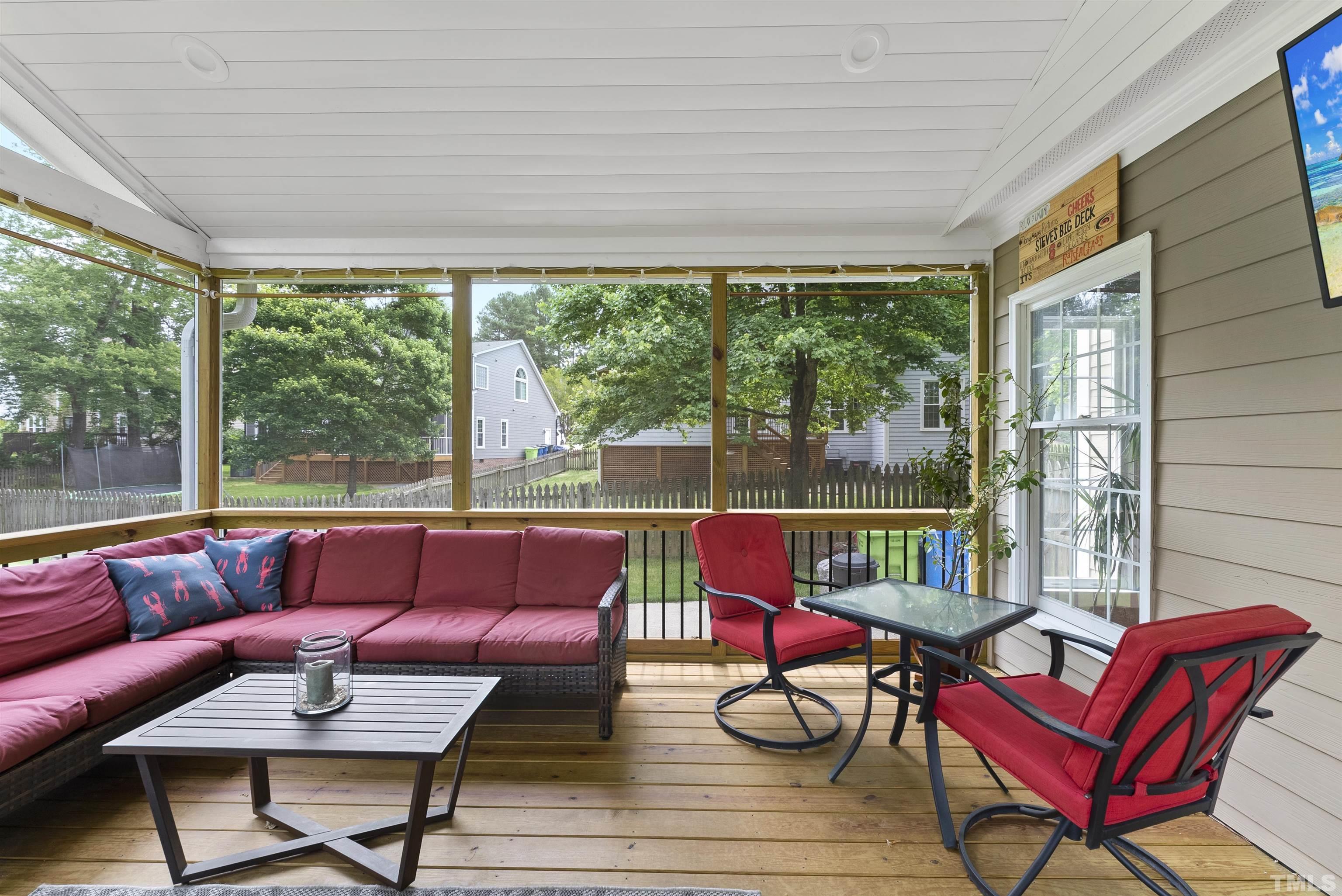 12304 Tappersfield Court Raleigh, NC 27613 - Photo 33 of 41 a roof deck with a table and chairs