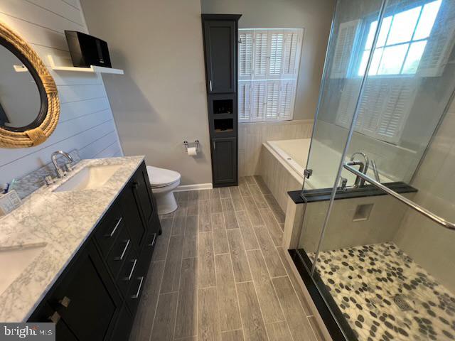 83 Zelkova Road Smyrna, DE 19977 - Photo 48 of 117 a bathroom with a granite countertop sink a toilet and bathtub