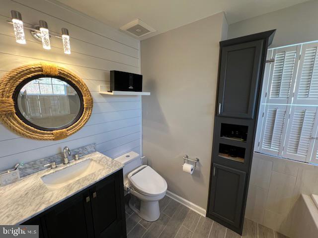 83 Zelkova Road Smyrna, DE 19977 - Photo 49 of 117 a bathroom with a sink a toilet and a mirror