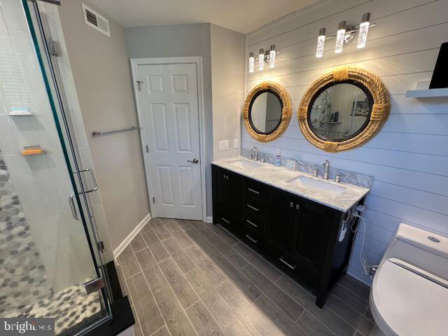 83 Zelkova Road Smyrna, DE 19977 - Photo 51 of 117 a bathroom with a toilet a sink and a mirror