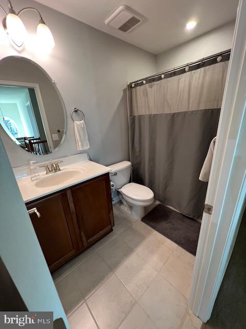 83 Zelkova Road Smyrna, DE 19977 - Photo 80 of 117 a bathroom with a sink a toilet a mirror and vanity