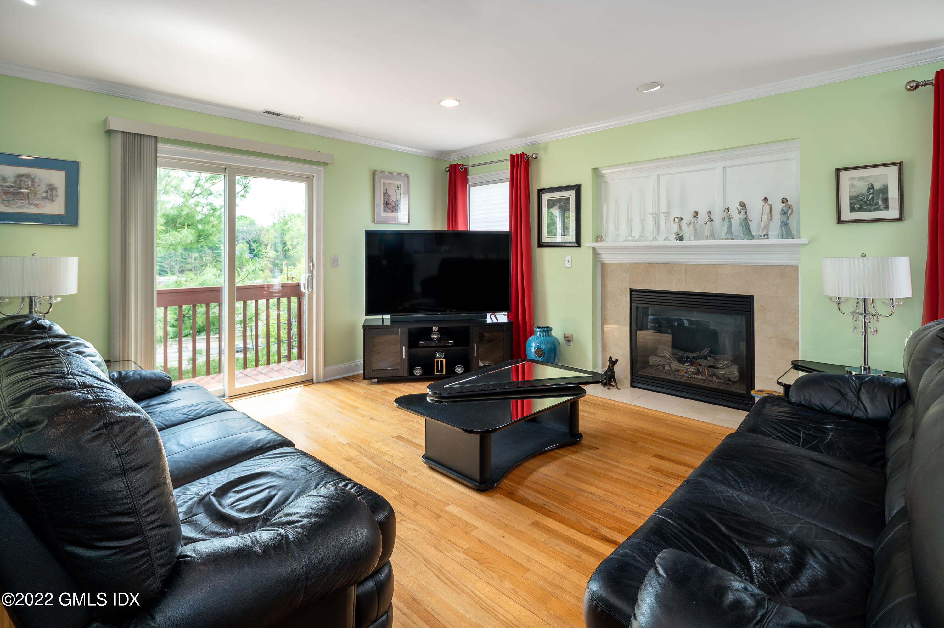 53 Rodwell Avenue, Unit B Greenwich, CT 06830 - Photo 11 of 33 a living room with furniture and a flat screen tv