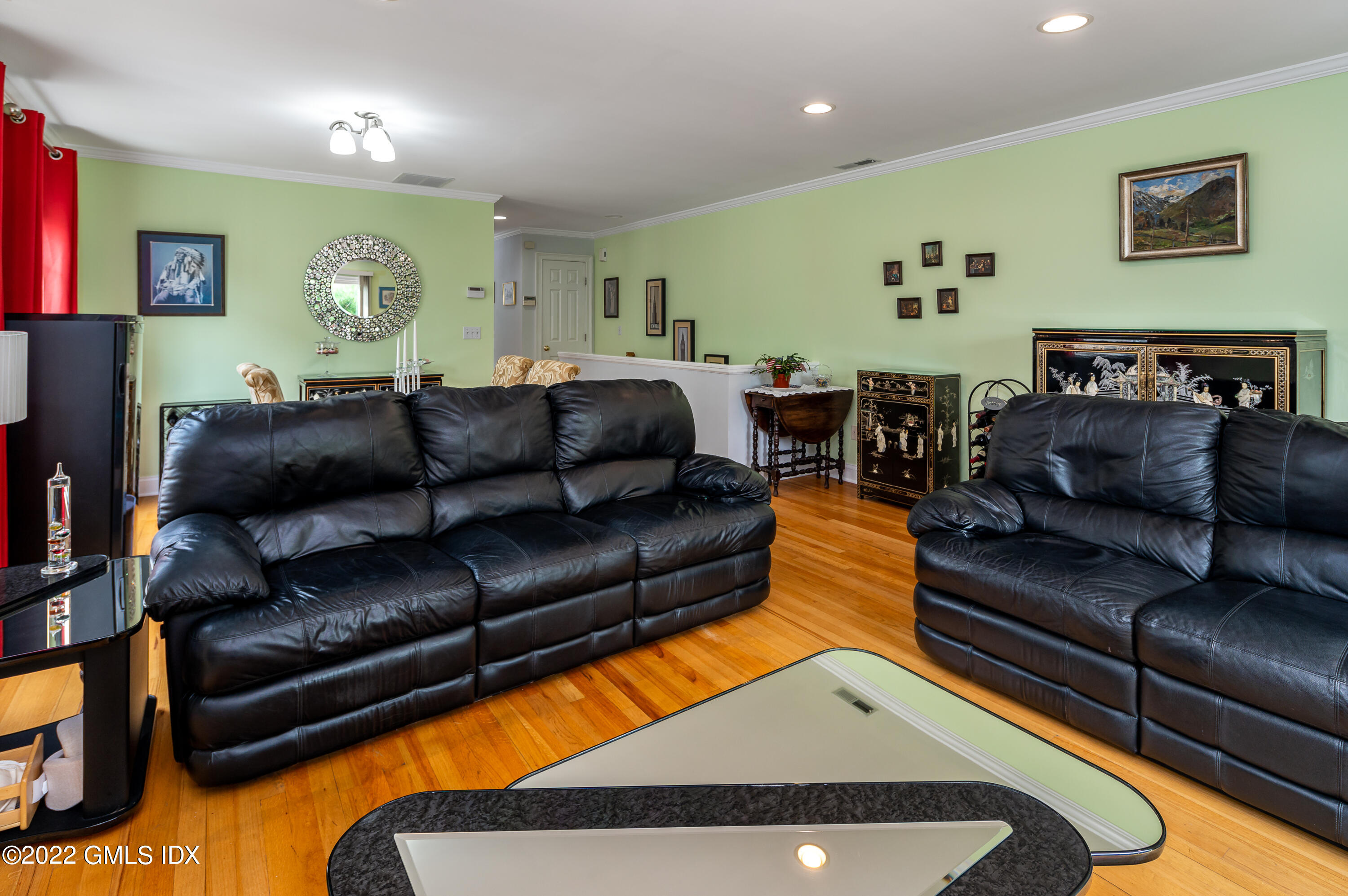 53 Rodwell Avenue, Unit B Greenwich, CT 06830 - Photo 12 of 33 a living room with furniture and a couch