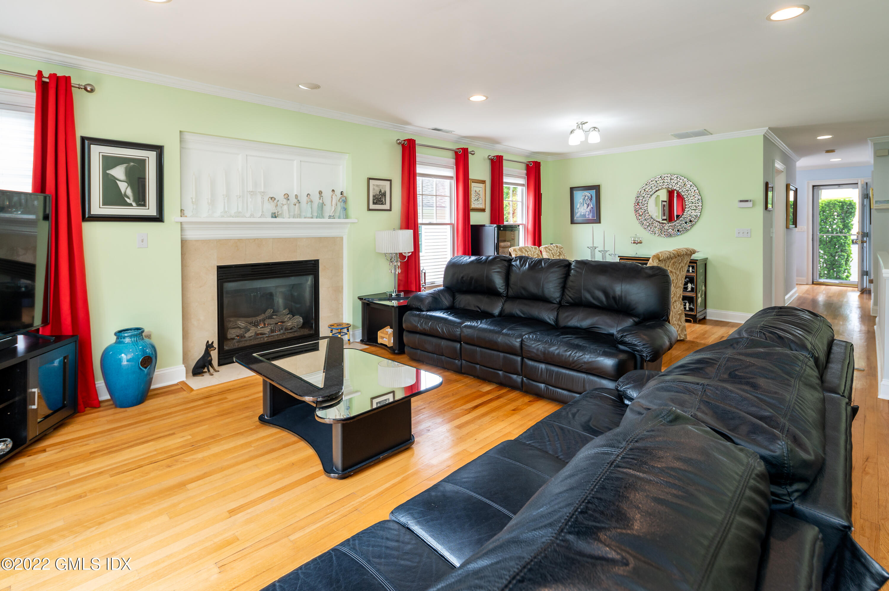53 Rodwell Avenue, Unit B Greenwich, CT 06830 - Photo 13 of 33 a living room with furniture or couch and a fireplace