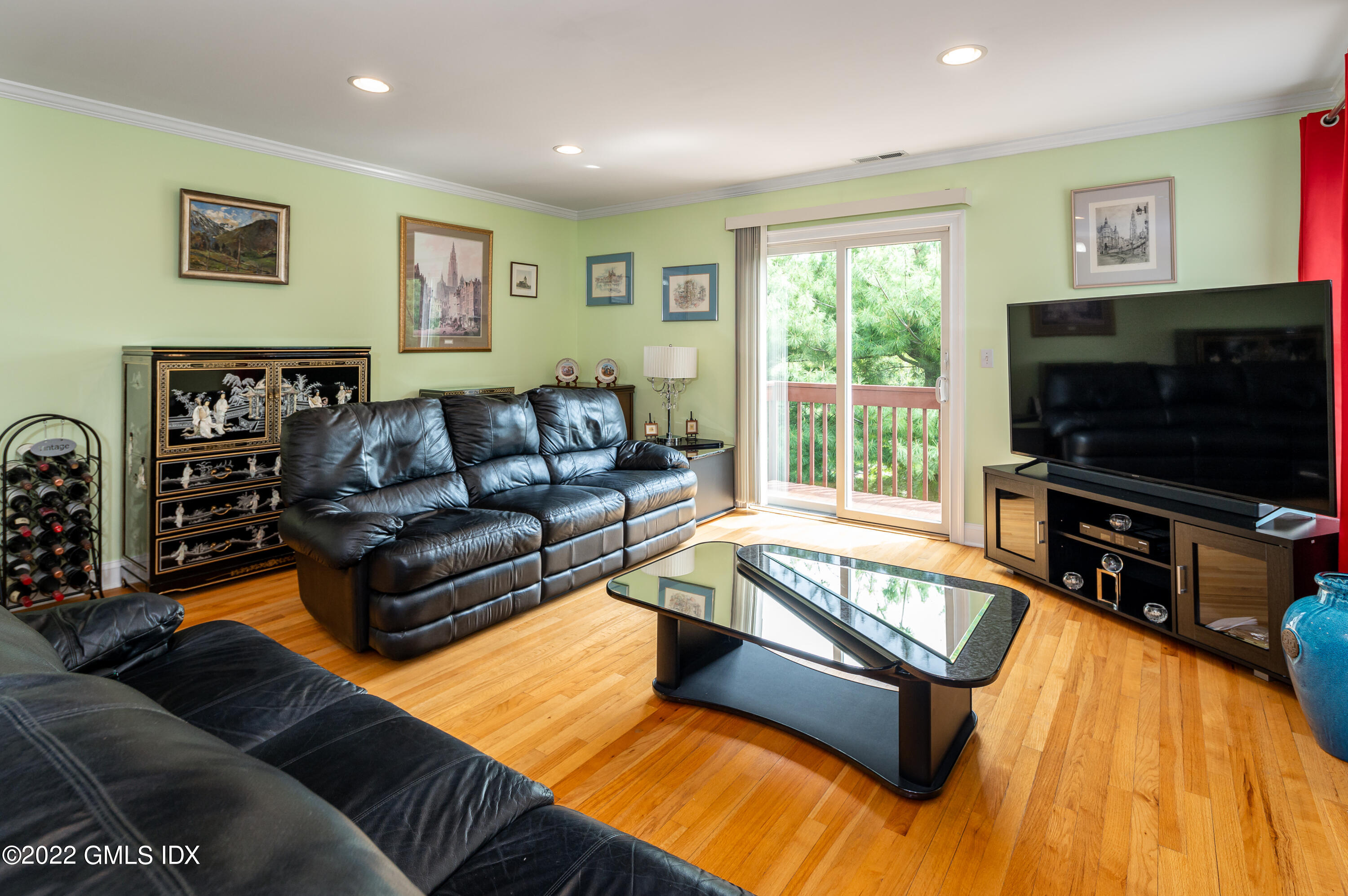 53 Rodwell Avenue, Unit B Greenwich, CT 06830 - Photo 14 of 33 a living room with furniture and a flat screen tv