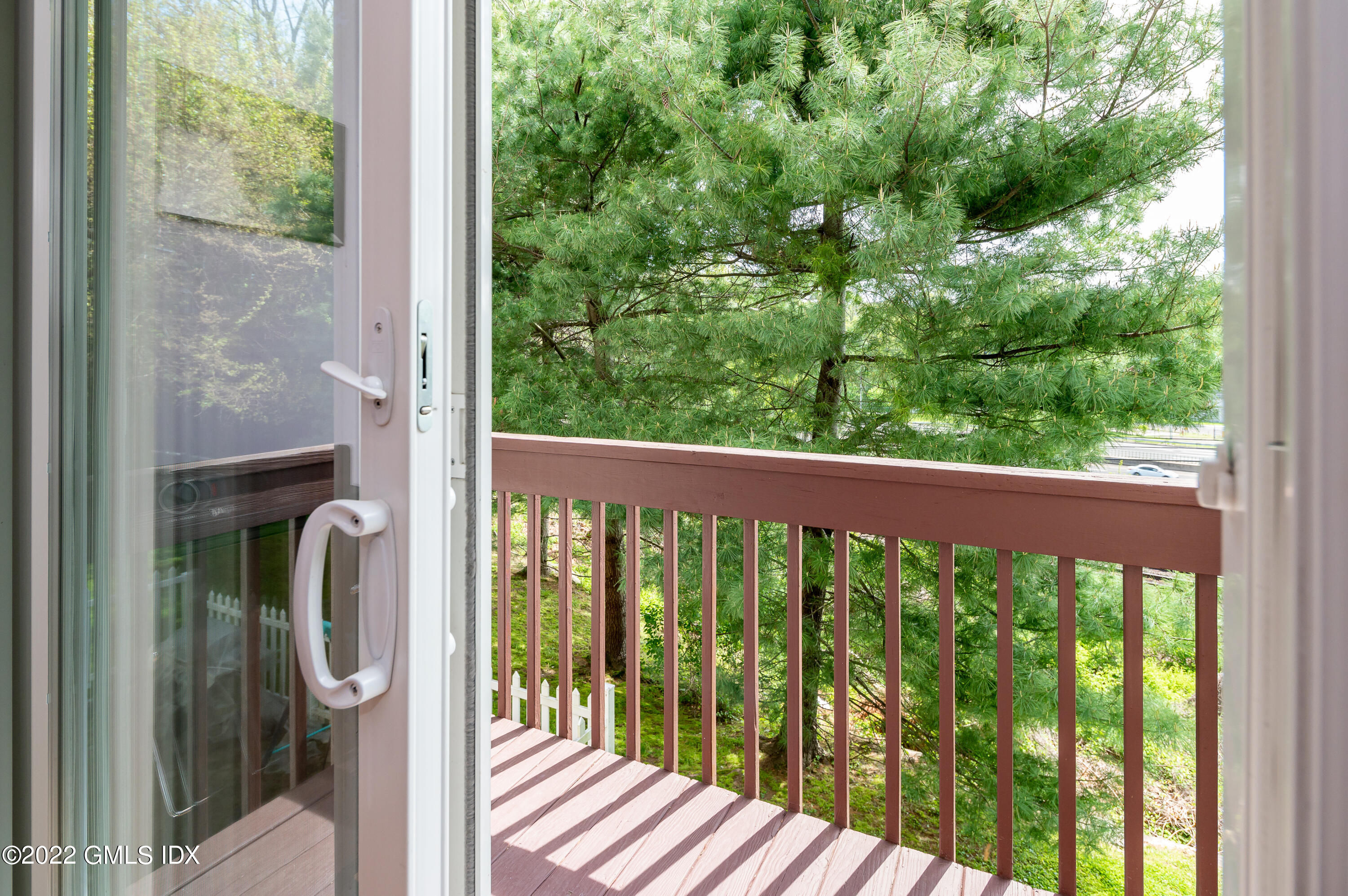 53 Rodwell Avenue, Unit B Greenwich, CT 06830 - Photo 15 of 33 a view of a balcony with wooden floor
