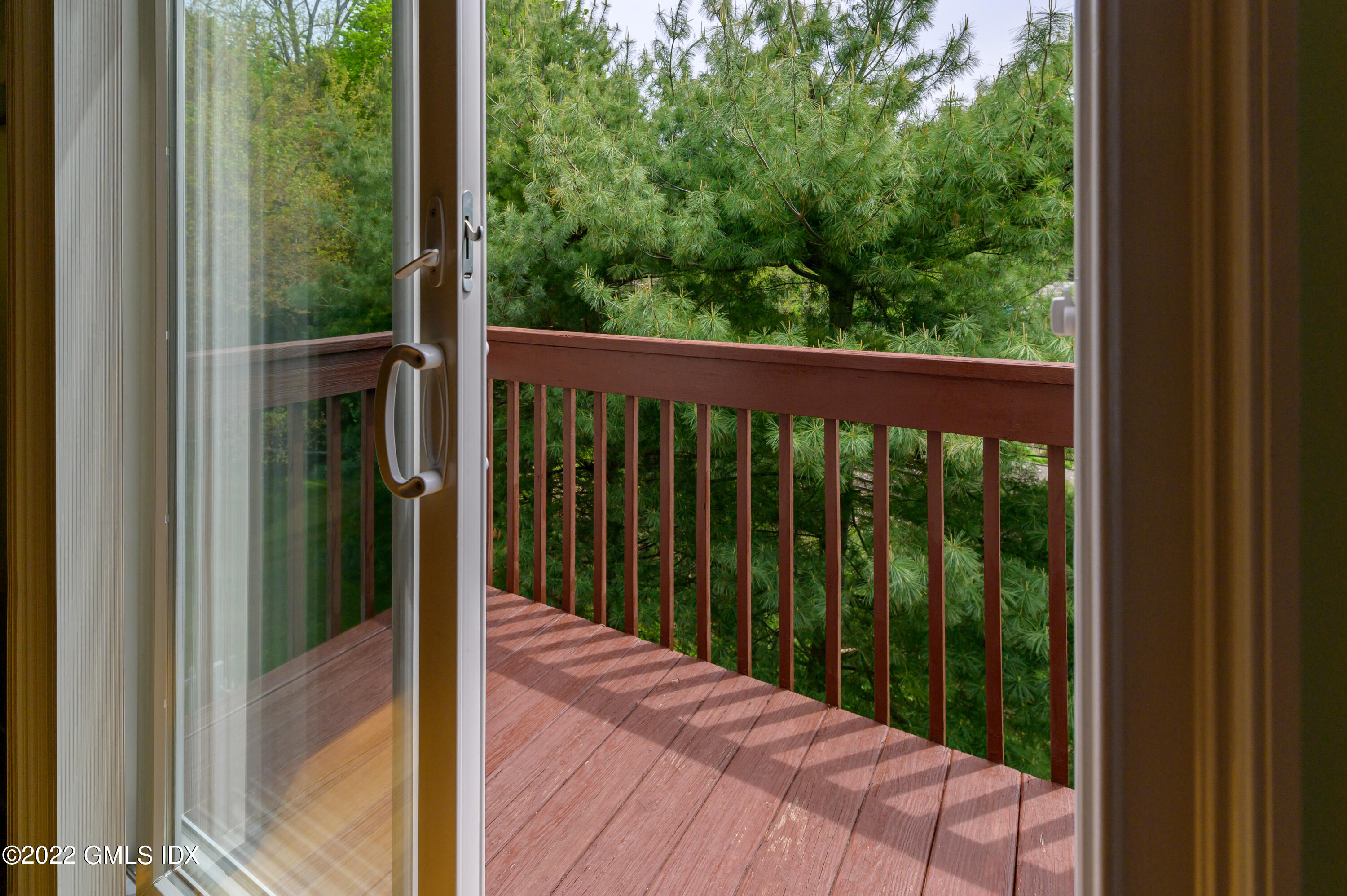 53 Rodwell Avenue, Unit B Greenwich, CT 06830 - Photo 16 of 33 a balcony with a yard