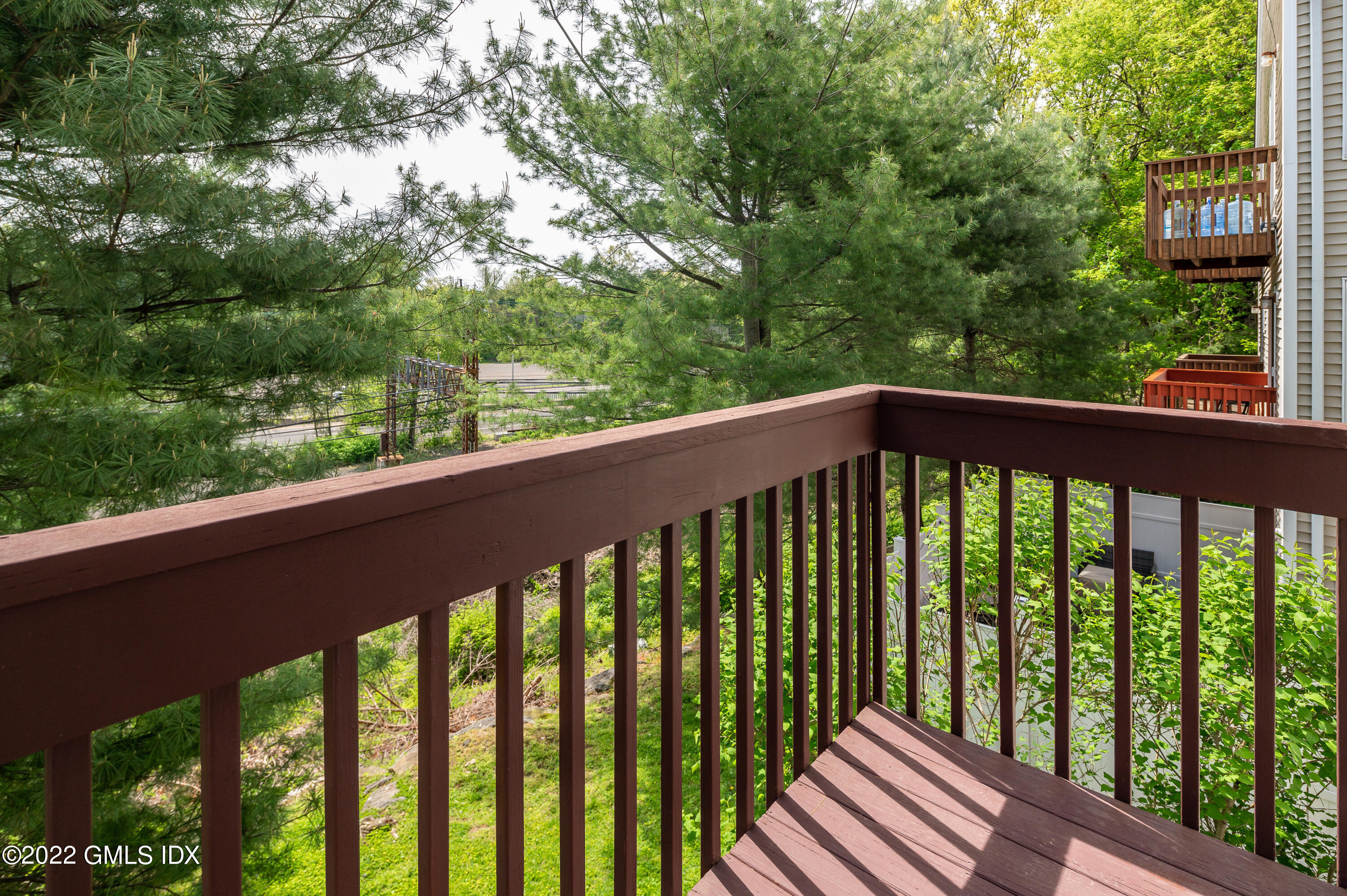 53 Rodwell Avenue, Unit B Greenwich, CT 06830 - Photo 17 of 33 a view of a wooden deck