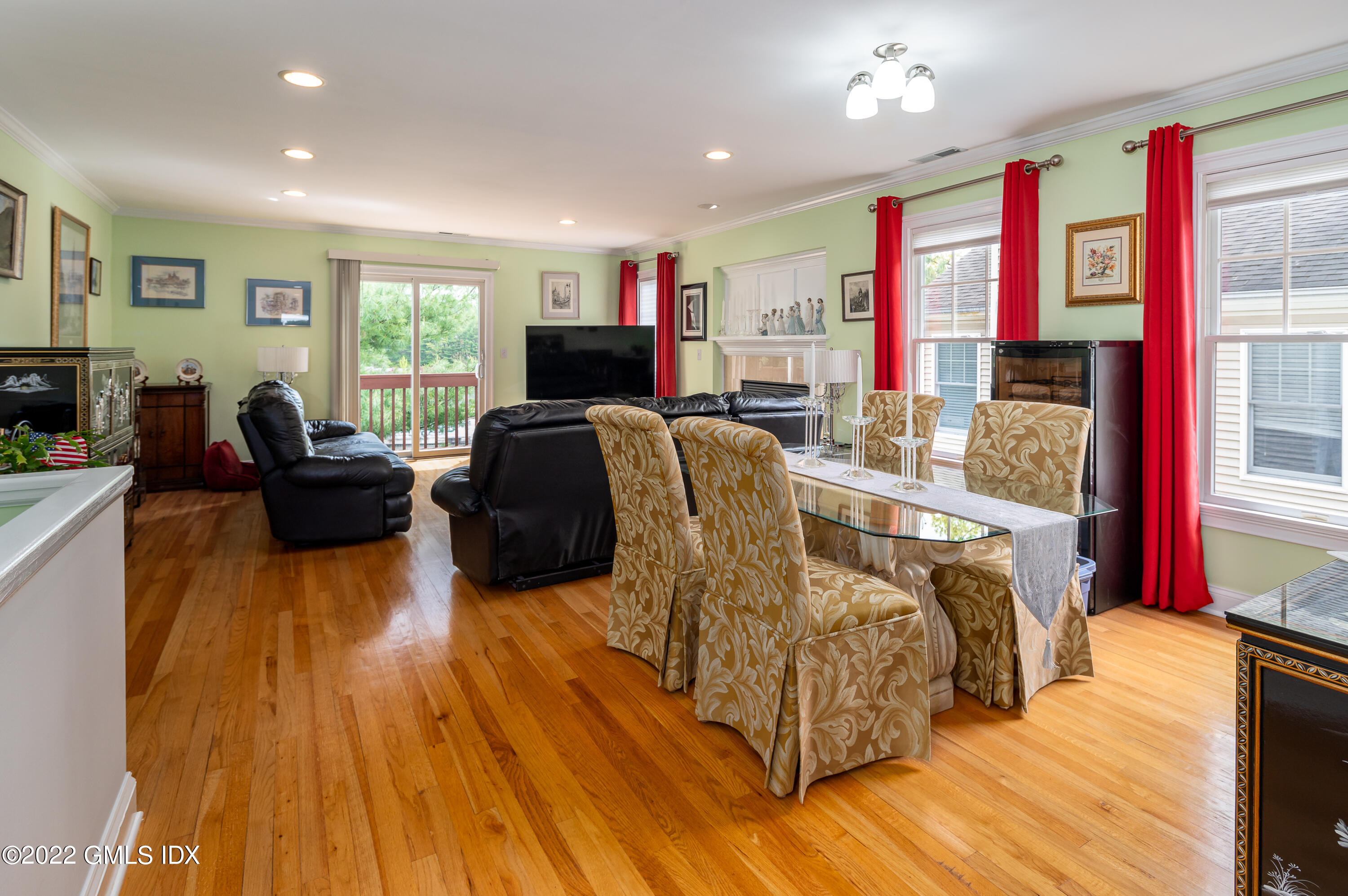 53 Rodwell Avenue, Unit B Greenwich, CT 06830 - Photo 9 of 33 a living room with furniture and a flat screen tv
