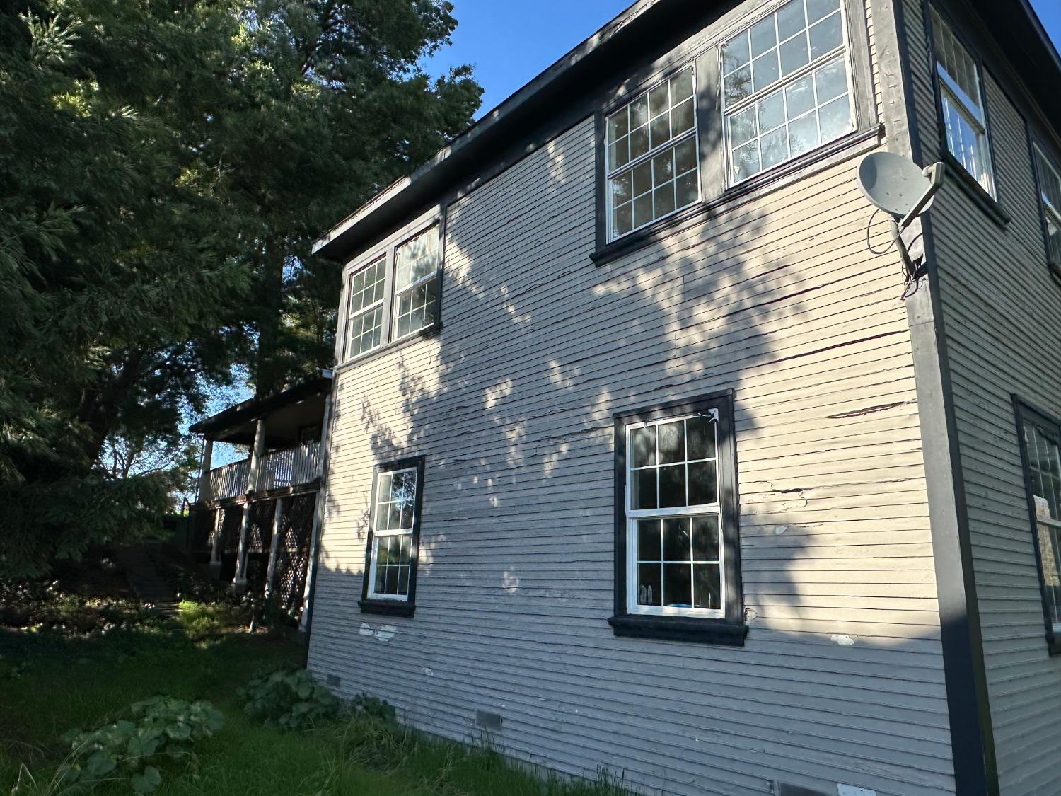 14055 River Road Walnut Grove, CA 95690 - Photo 5 of 55 a view of backyard with barbeque and wooden stairs