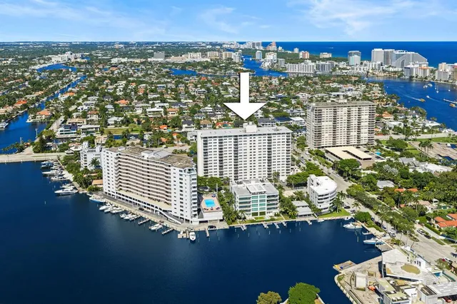 a view of a lake with a multi story building