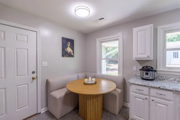 a kitchen with sink and window