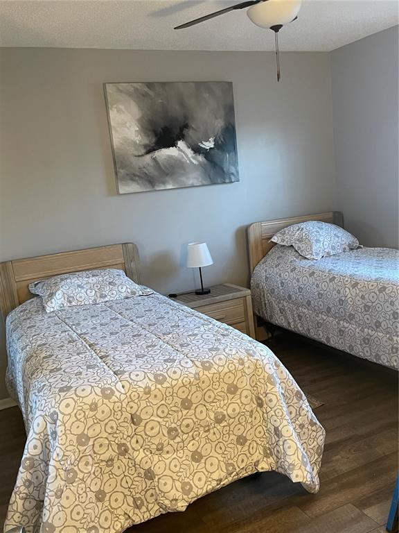 14531 Walsingham Road, Unit 203 Largo, FL 33774 - Photo 16 of 24 a bedroom with bed and window