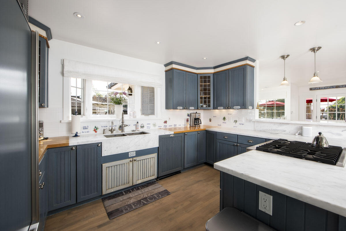 1112 Hill Road Montecito, CA 93108 - Photo 11 of 33 a kitchen with a sink stove and cabinets