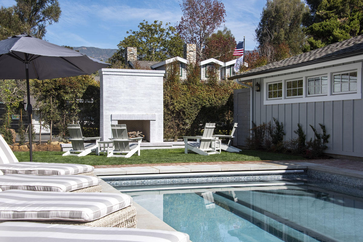 1112 Hill Road Montecito, CA 93108 - Photo 7 of 33 a view of a house with a yard fire pit and furniture