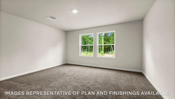 an empty room with large window