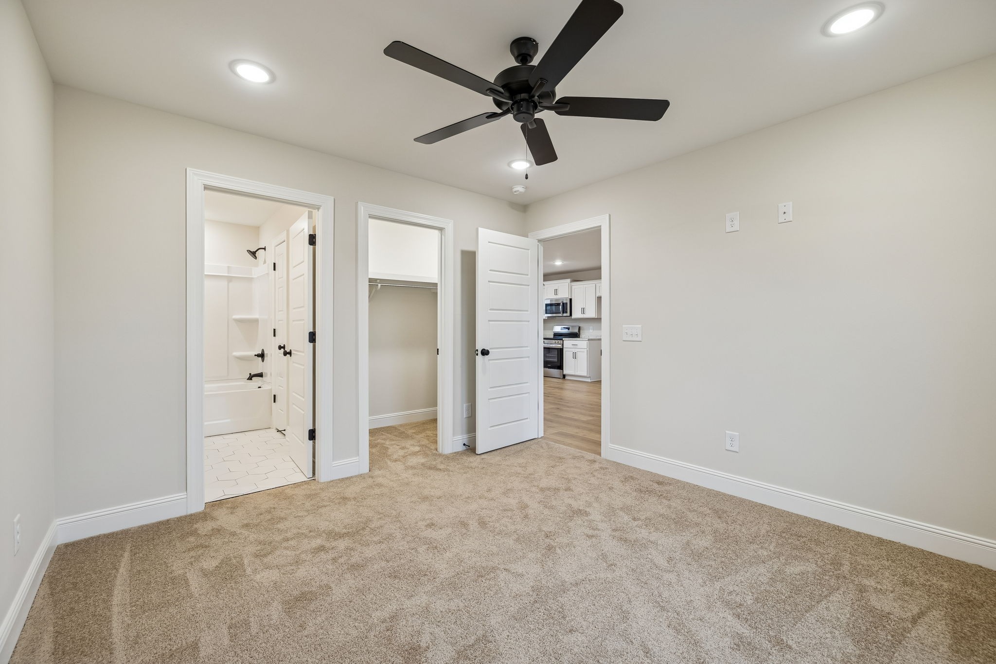 1015 Landing Lane Adams, TN 37010 - Photo 14 of 27 a view of a livingroom with a chandelier fan and windows