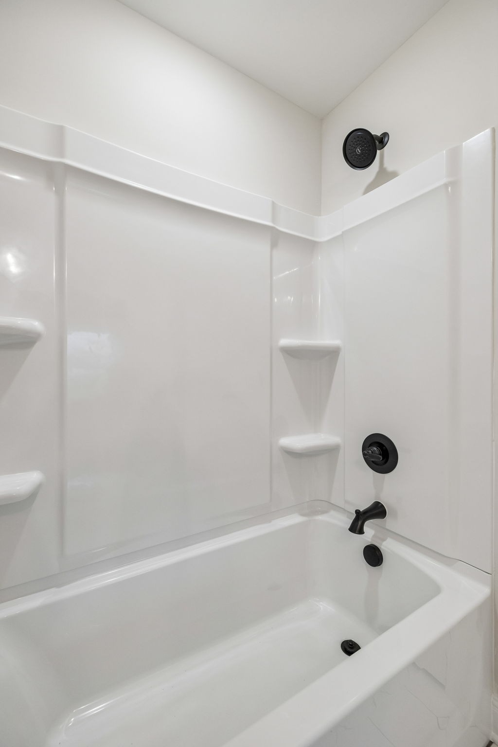 1015 Landing Lane Adams, TN 37010 - Photo 17 of 27 a bathroom with a bathtub