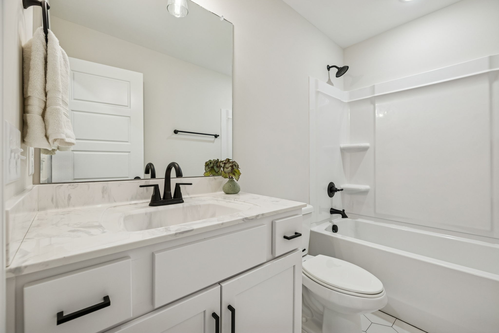 1015 Landing Lane Adams, TN 37010 - Photo 20 of 27 a bathroom with a sink a toilet and shower