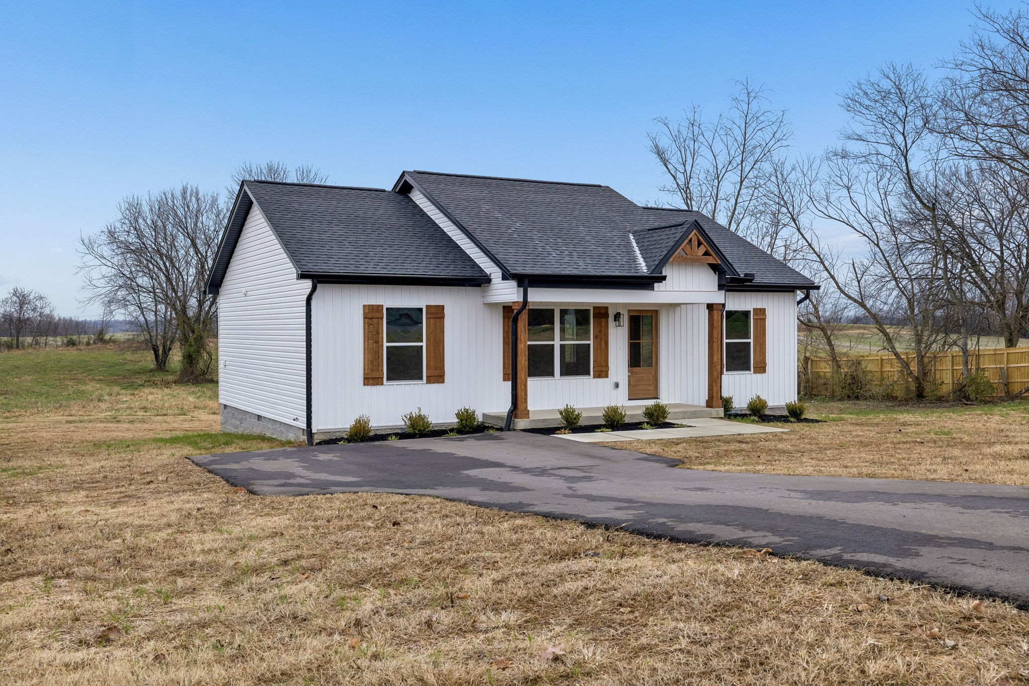 1015 Landing Lane Adams, TN 37010 - Photo 3 of 27 a house view with a outdoor space