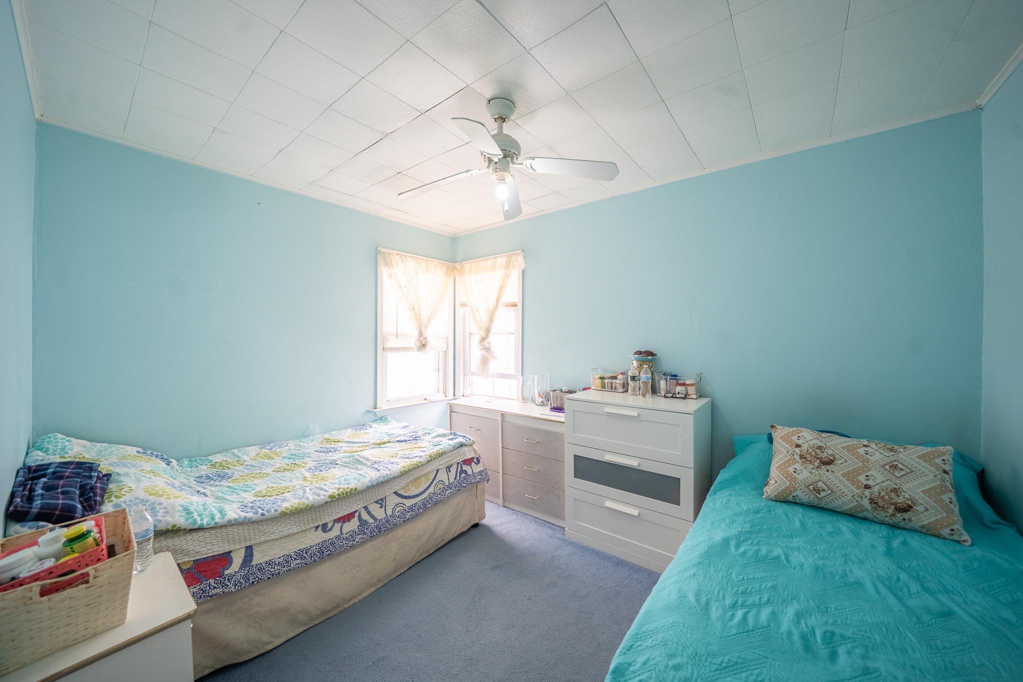 47 Cardinal Road Levittown, NY 11756 - Photo 11 of 27 Carpeted bedroom featuring ceiling fan